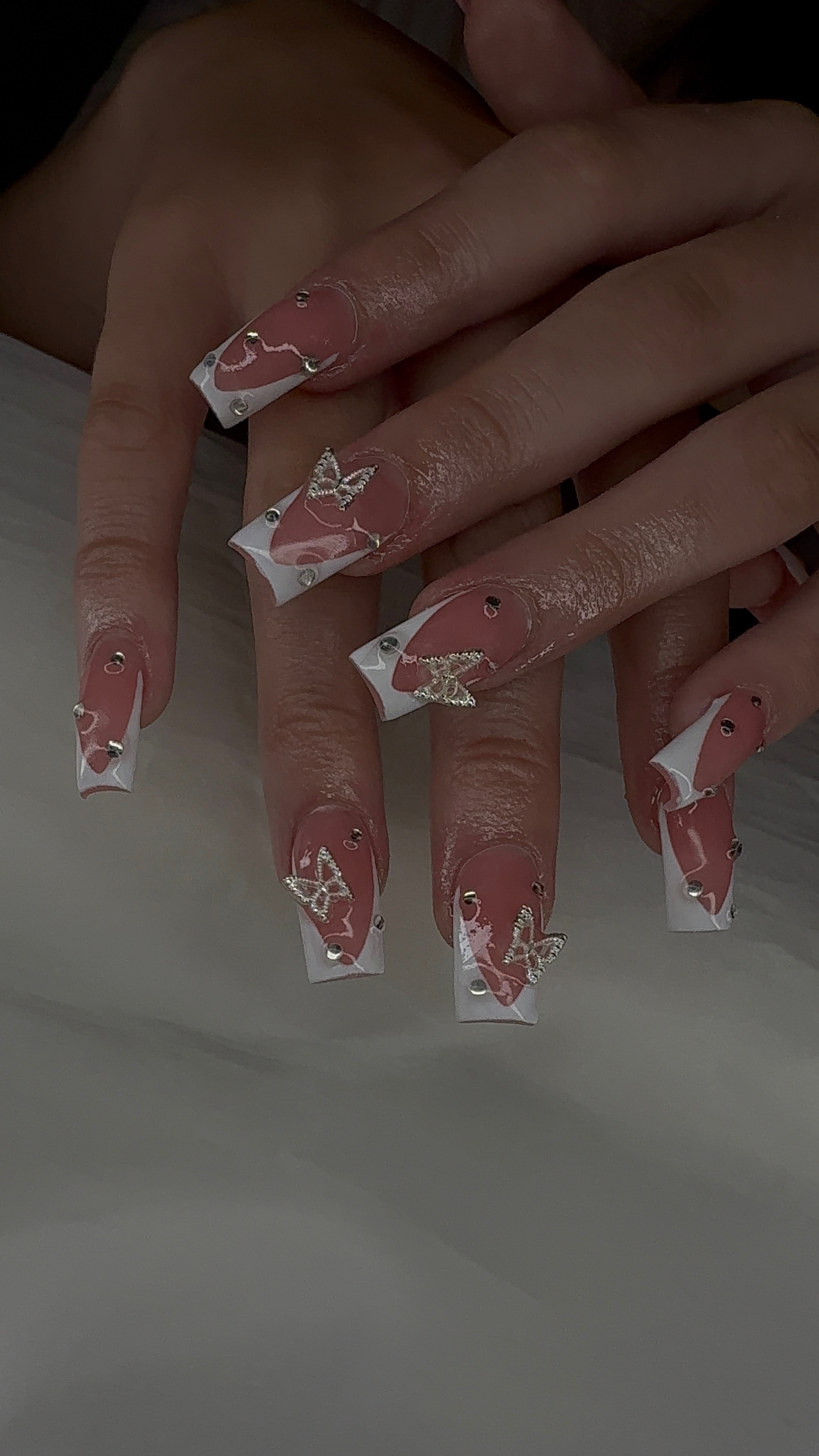 Chrome French tips with accent glitter